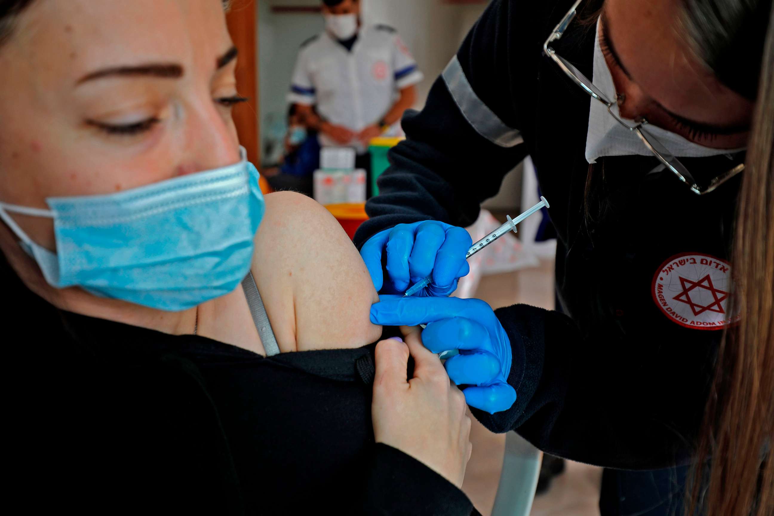 PHOTO: A health worker administers a dose of the Pfizer-BioNtech COVID-19 coronavirus vaccine at a mobile clinic near Moshav Dalton in northern Israel on Feb. 22, 2021.