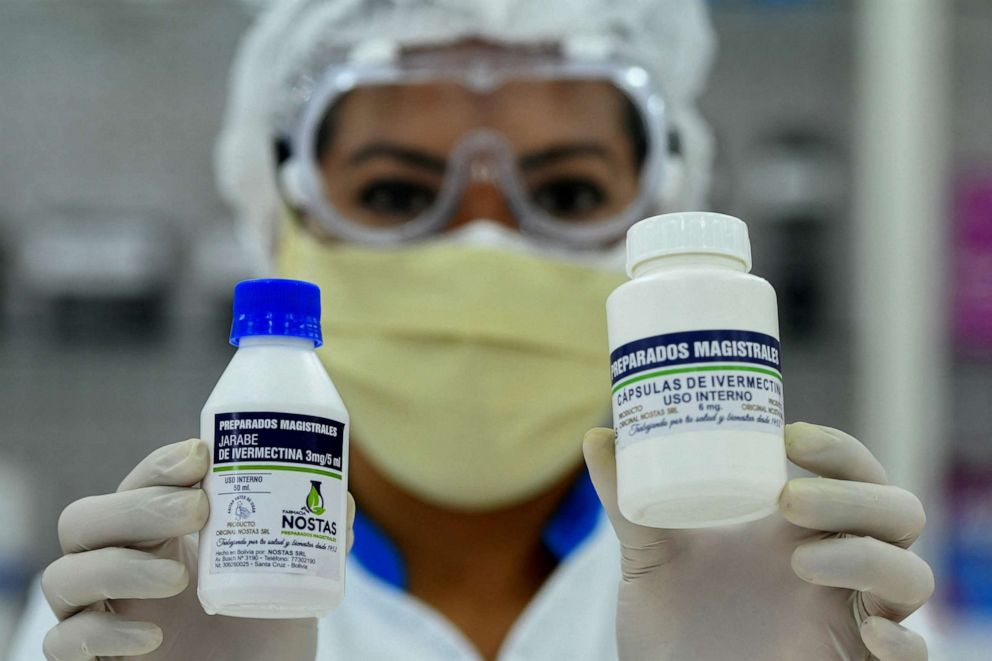 FILE PHOTO: A pharmacist holds the anti-parasite drug ivermectin in Santa Cruz, Bolivia May 19, 2020.