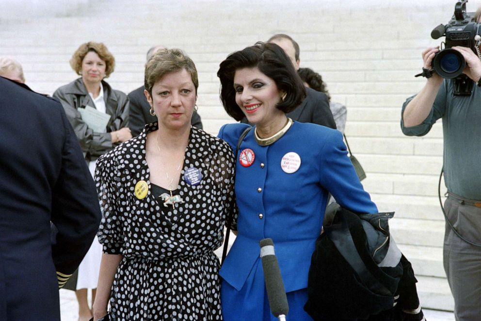PHOTO: Norma Mc Corvey, known as "Jane Roe" of the 1973 Supreme Court decision Roe v. Wade, left, is accompanied by her attorney, Gloria Allred at the Supreme Court building on April 26, 1989, in Washington, D.C.