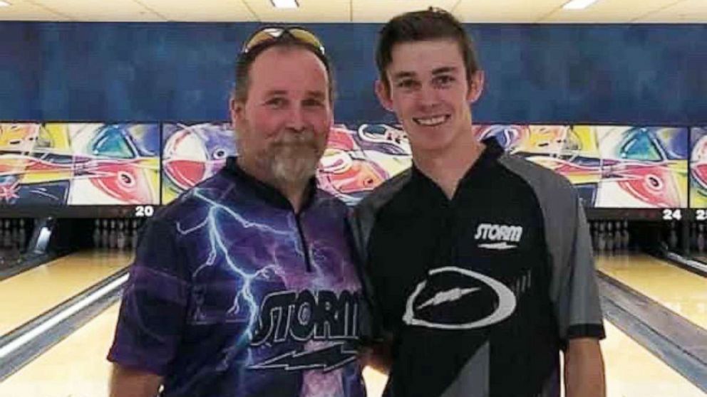 PHOTO: Jeff Sales at a bowling alley with his oldest son, Brayden.