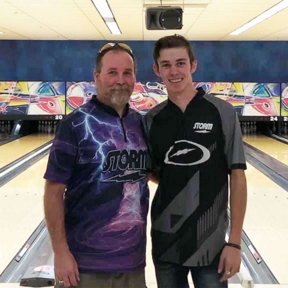 PHOTO: Jeff Sales at a bowling alley with his oldest son, Brayden.
