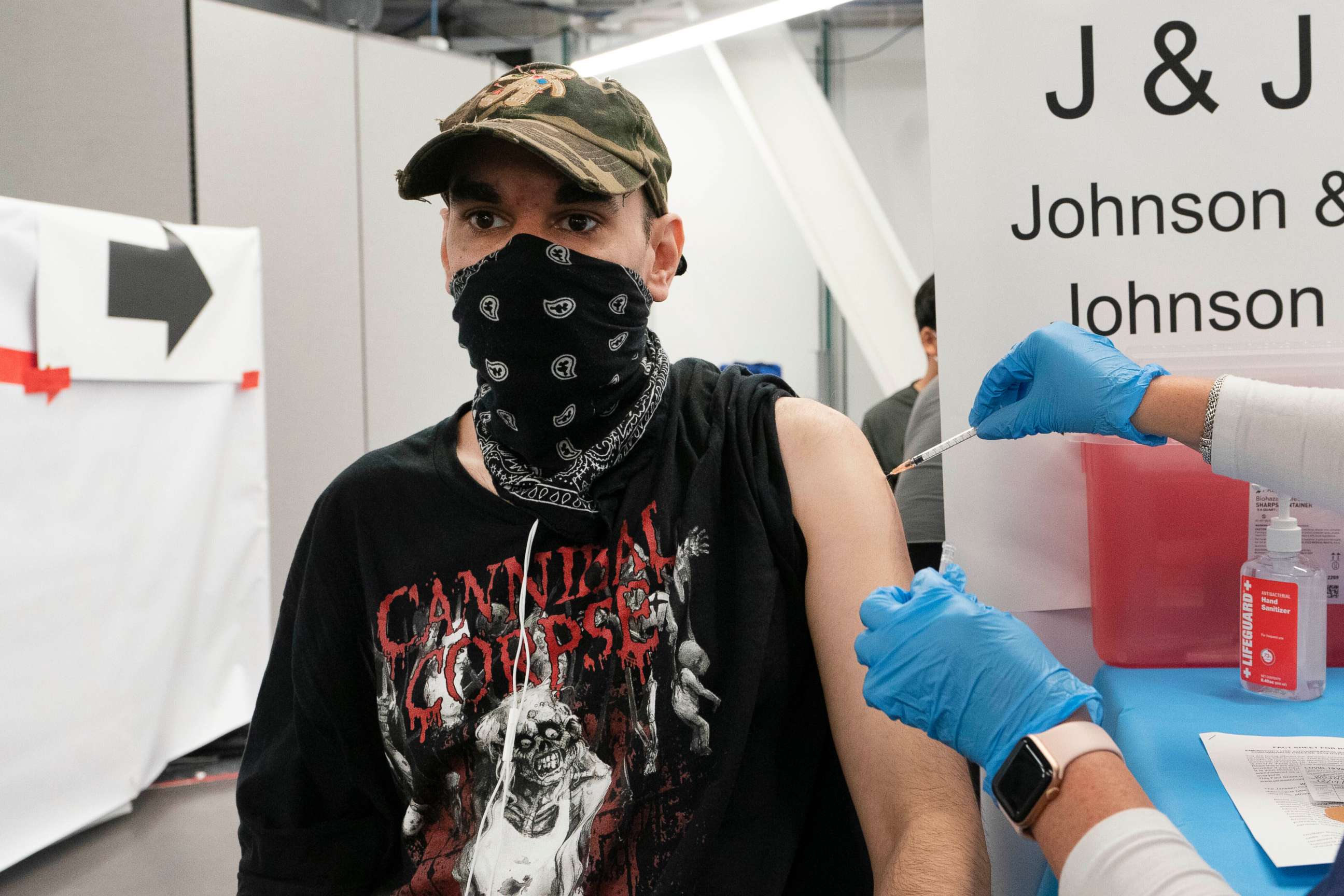 PHOTO: FILE - In this July 30, 2021, file photo, Jay Vojno gets the Johnson & Johnson COVID-19 vaccine, in New York. 