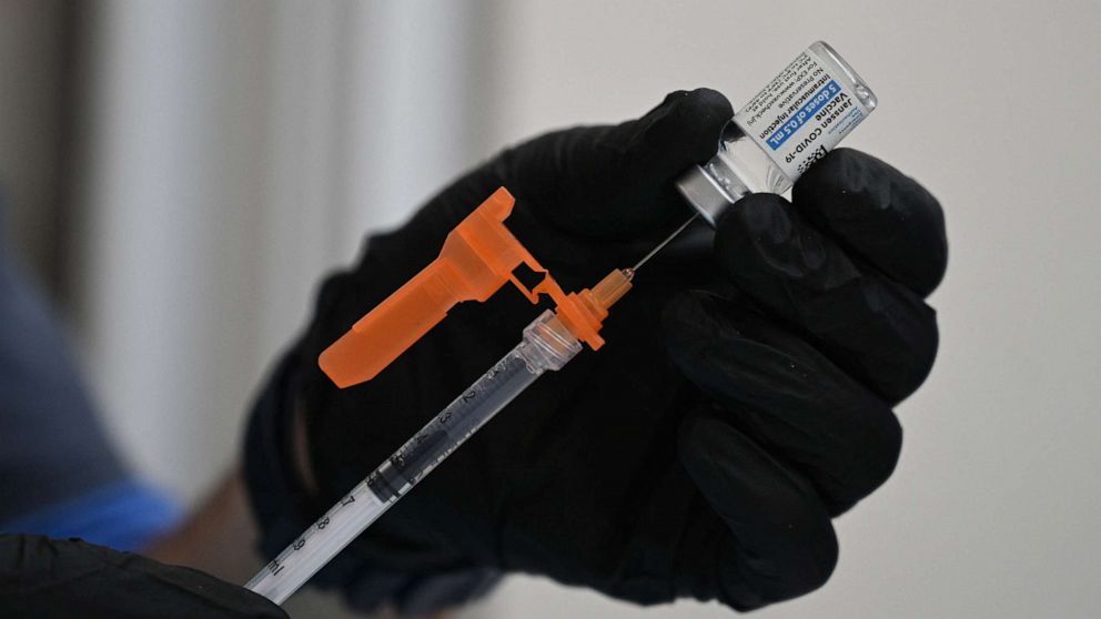 PHOTO: A nurse fills a syringe with Johnson & Johnson's Janssen Covid-19 vaccine in Pasadena, Calif., Aug. 19, 2021.