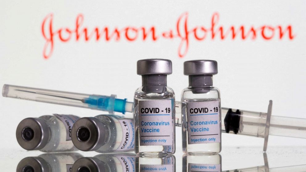 FILE PHOTO: Vials labeled "COVID-19 Coronavirus Vaccine" and syringe are seen in front of displayed Johnson & Johnson logo in this illustration taken, Feb. 9, 2021. REUTERS/Dado Ruvic/Illustration/File Photo