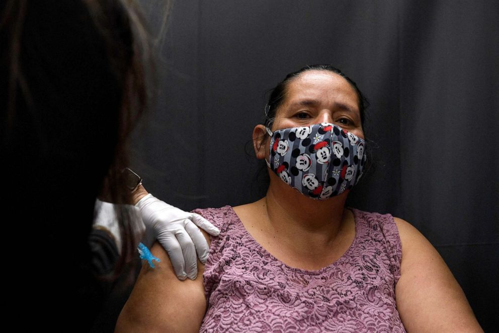 PHOTO: A farm worker receives a dose of the Johnson & Johnson Janssen Covid-19 vaccine at a vaccination site organized by the United Farm Workers (UFW), Kern Medical, and the Kern County Latino Covid-19 Task Force on March 13, 2021 in Delano, Calif.