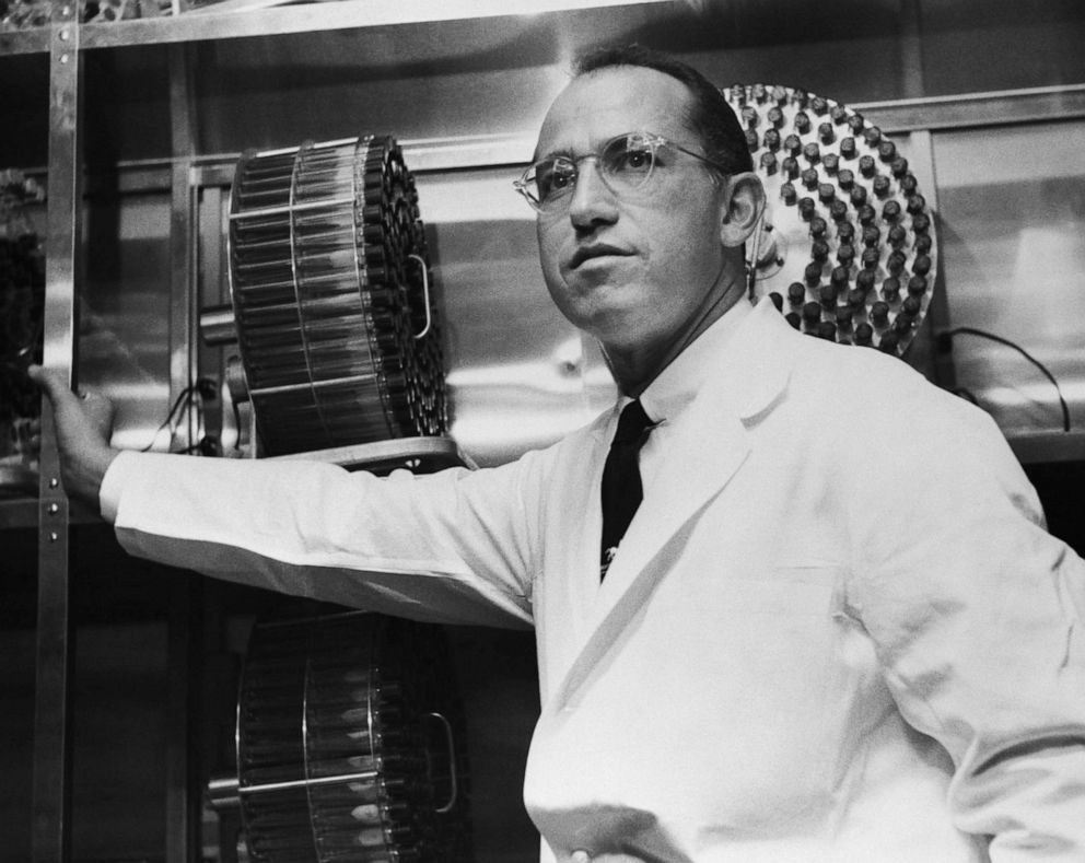 PHOTO: Dr. Jonas Salk stands in the University of Pittsburgh laboratory in which he developed a vaccine for polio.