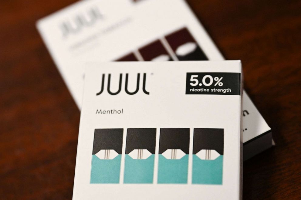 PHOTO: In this file photo taken on June 23, 2022, JUUL Labs Inc. Virginia tobacco and menthol flavored vaping e-cigarette products are displayed in a convenience store in El Segundo, Calif.
