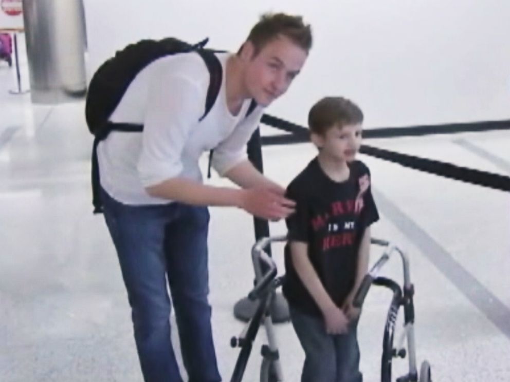 PHOTO: Grant Berg, 8, meets Marvin Zumkley, a German college student who donated bone marrow to Berg three years ago, at Los Angeles International Airport on May 3, 2015.