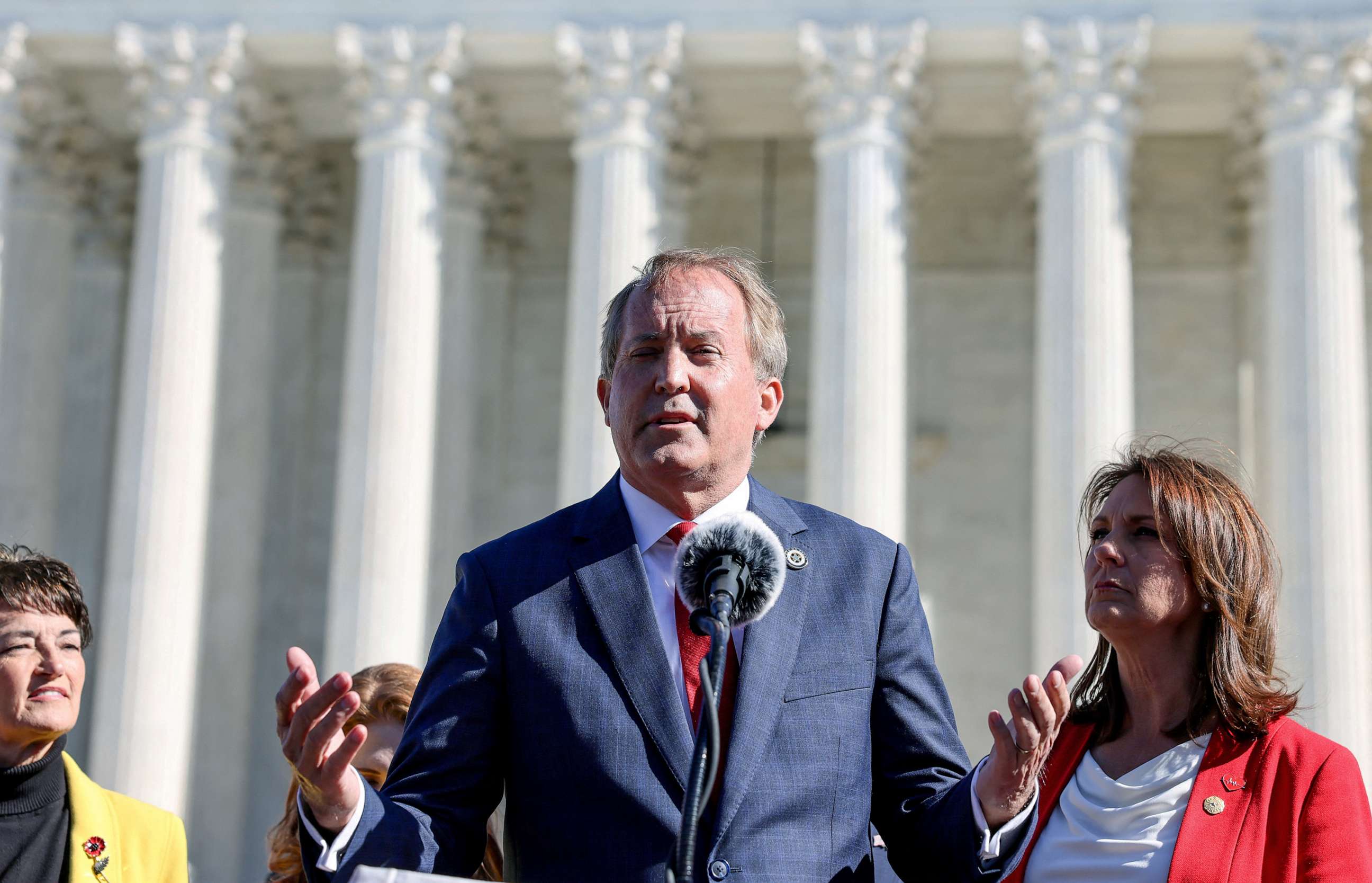 PHOTO: Texas Attorney General Ken Paxton speaks to anti-abortion supporters outside the U.S. Supreme Court following arguments over a challenge to a Texas law that bans abortion after six weeks in Washington, D.C., Nov. 1, 2021.