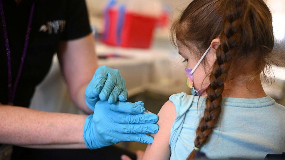 PHOTO: A nurse administers a pediatric dose of the Covid-19 vaccine to a girl at a L.A. Care Health Plan vaccination clinic at Los Angeles Mission College in the Sylmar neighborhood in Los Angeles, Jan. 19, 2022.