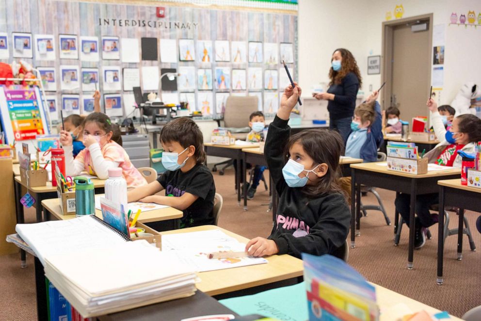 PHOTO: Kindergarten students s at Stanley Mosk Elementary school wear masks while indoors March 11, 2022. Students in the Los Angeles Unified School District are still wearing masks while in school. 