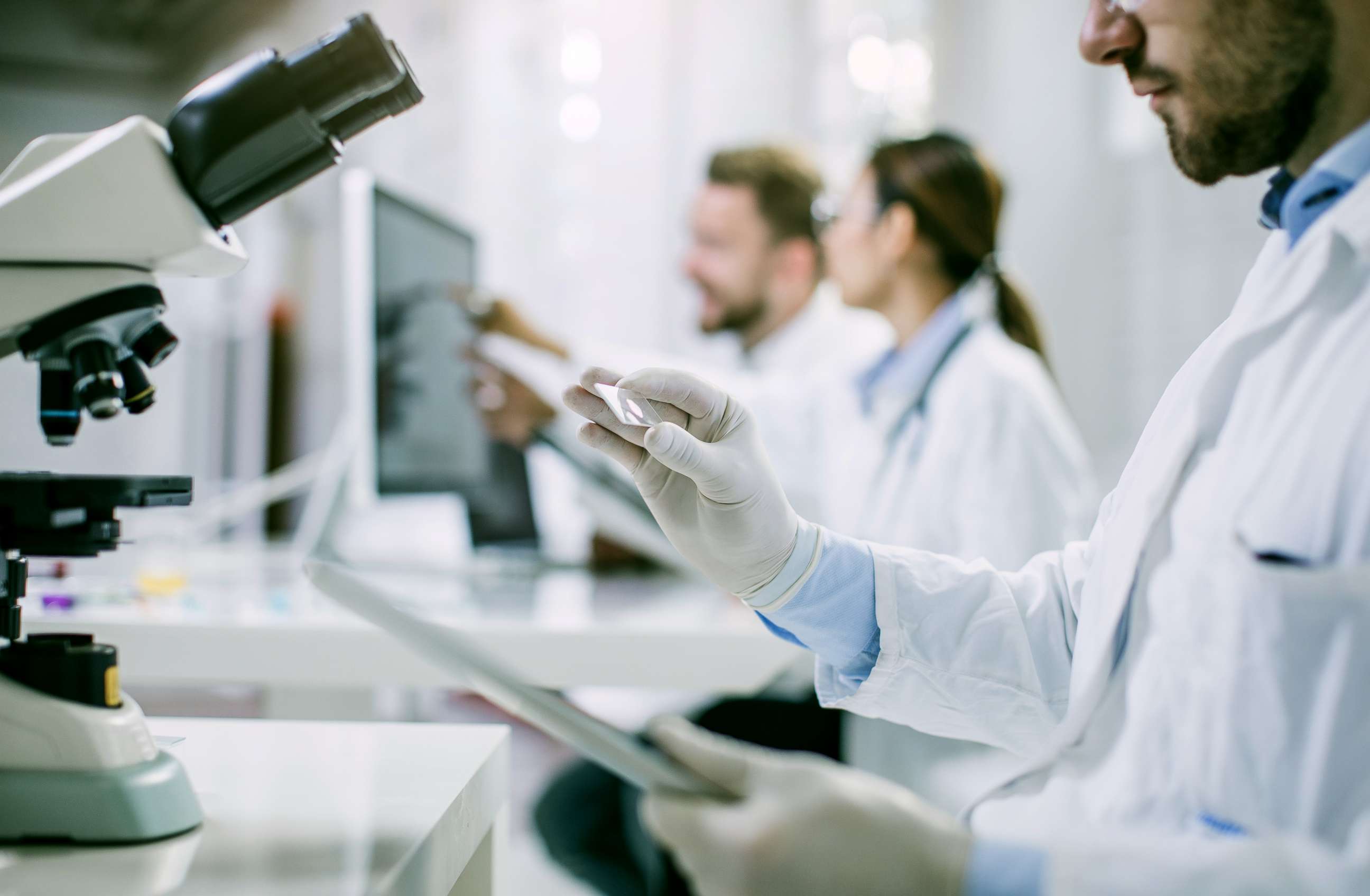 PHOTO: A scientist looks at a slide in this stock photo.