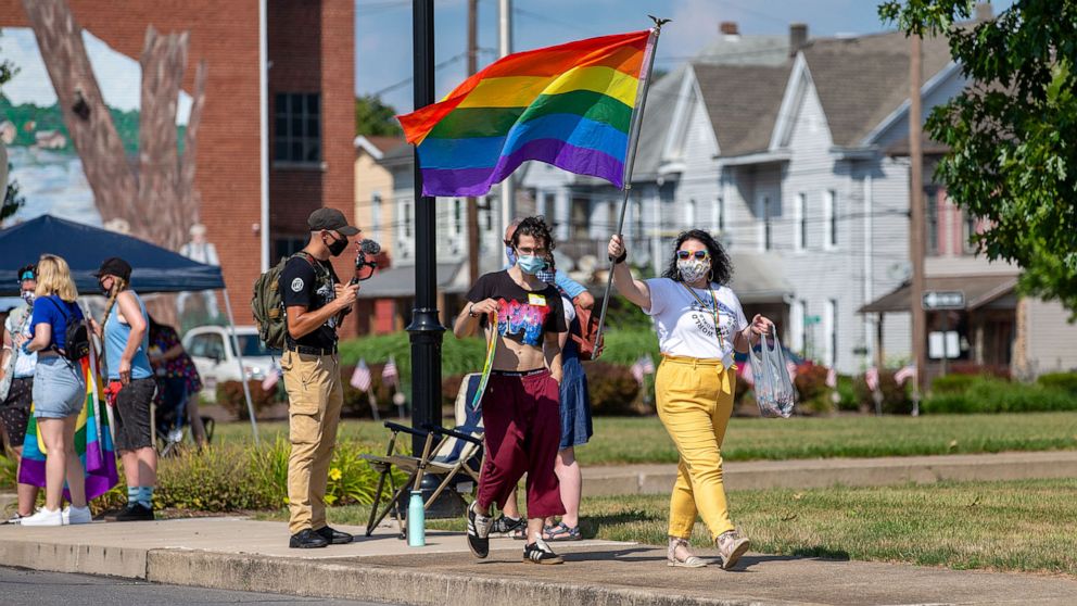 PHOTO: A rainbow flag is waved during the Pride Rally in Milton, Pa., Aug. 8, 2020. 