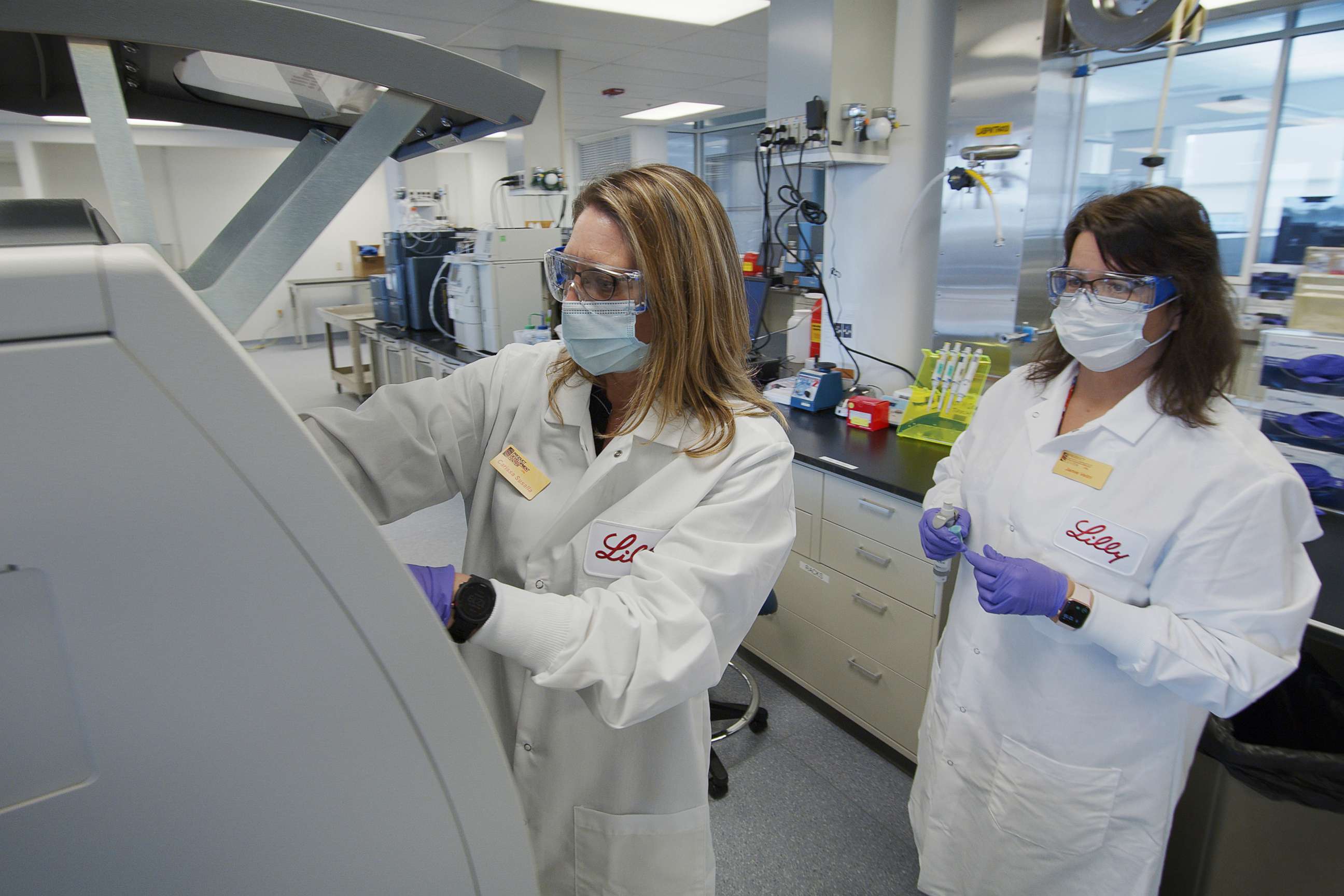 PHOTO: In this May 2020 photo provided by Eli Lilly, researchers prepare mammalian cells to produce possible COVID-19 antibodies for testing in a laboratory in Indianapolis. 