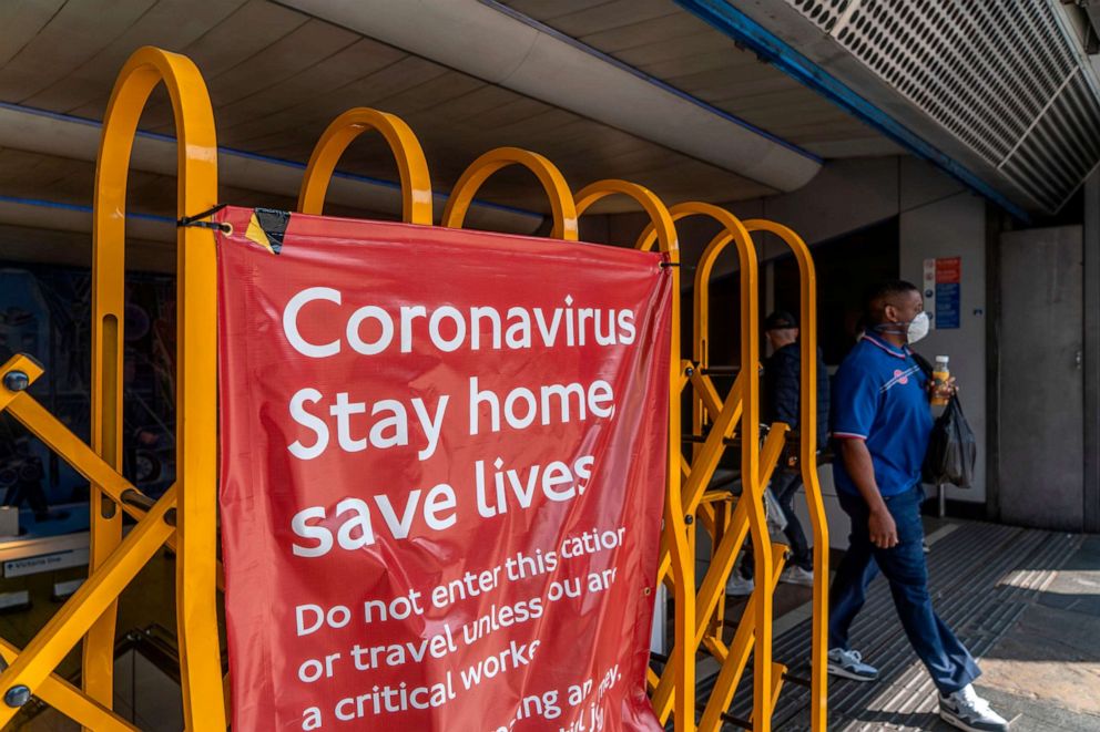PHOTO: A man exits Brixton underground station in Brixton, south London, April 23, 2020, during the lockdown designed to halt the spread of the novel coronavirus.