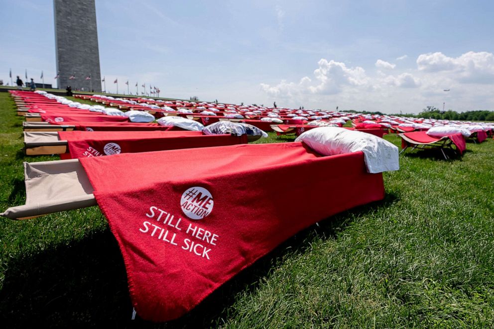 PHOTO: Advocates for people suffering from long COVID-19 and myalgic encephalomyelitis/chronic fatigue syndrome host an installation of 300 cots to represent the millions of people suffering, May 12, 2023, in Washington, D.C.
