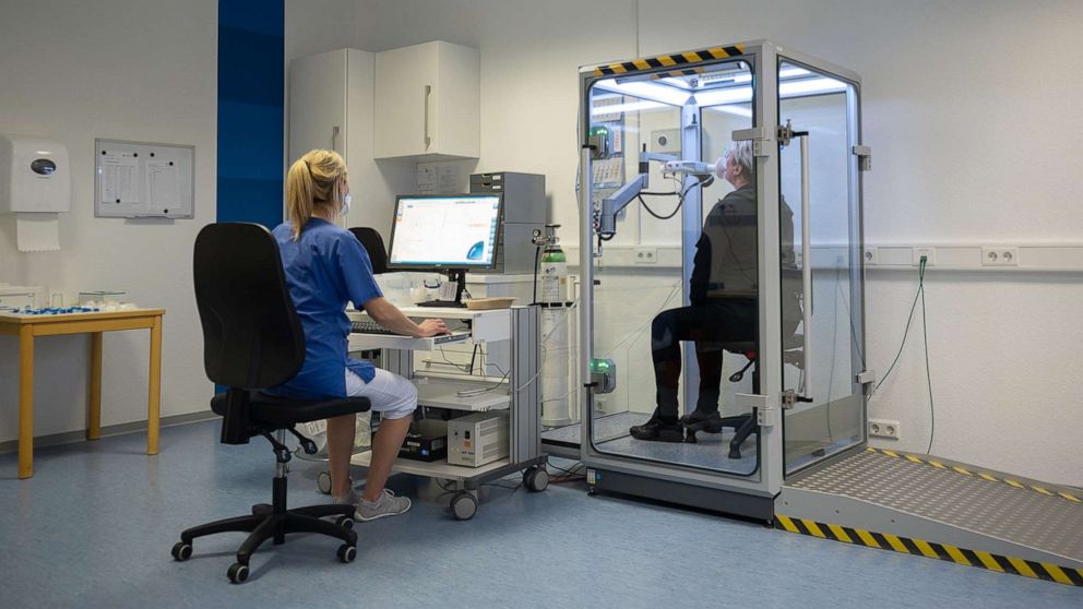 PHOTO: A long Covid-19 patient takes a lung function test at the Hufeland Clinic, Feb. 7, 2022, in Bad Ems, Germany.