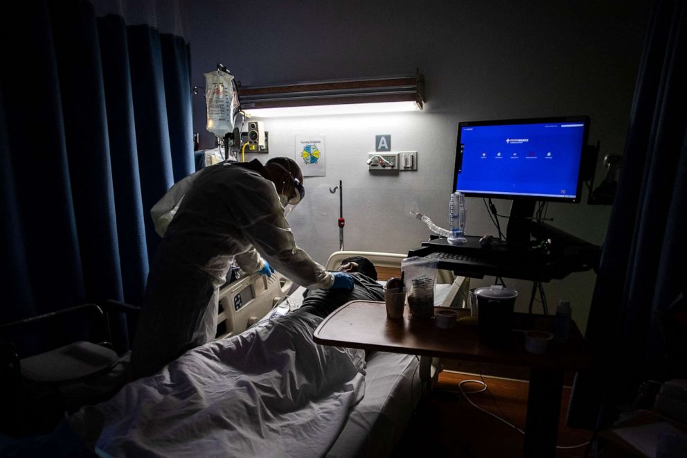 PHOTO: Doctor Delkhah Shahin checks on a 34 years old, unvaccinated, Covid-19 patient at Providence Cedars-Sinai Tarzana Medical Center in Tarzana, Calif. on Sept. 2, 2021.  