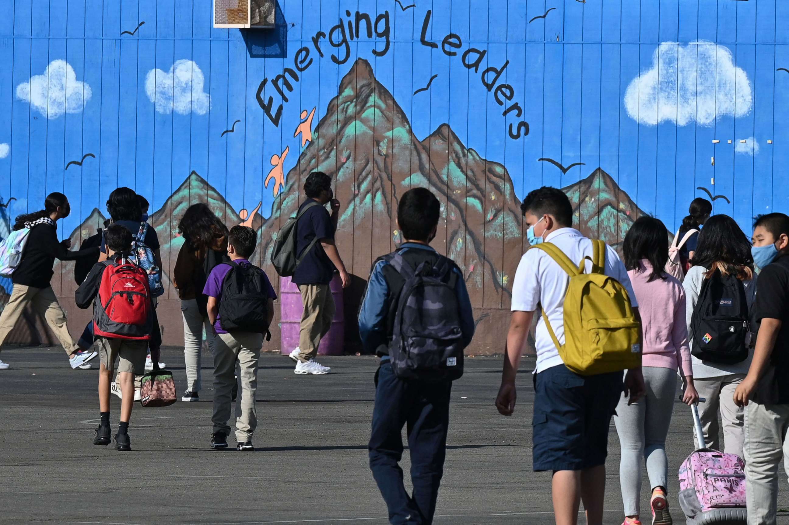 PHOTO: Students walk to their classrooms at a public middle school in Los Angeles, Sept. 10, 2021. 