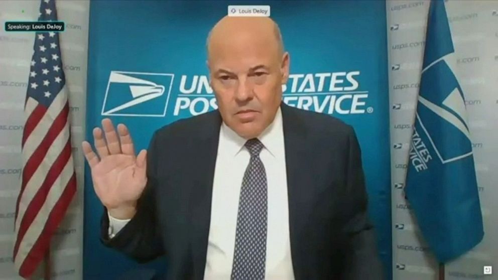 PHOTO: U.S. Postmaster General Louis DeJoy is sworn in to testify via video feed during a virtual hearing of the U.S. Senate Homeland Security and Governmental Affairs Committee in Washington, Aug. 21, 2020.