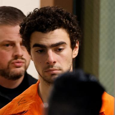 PHOTO: Luigi Mangione, 26, a suspect in the New York City killing of UnitedHealth executive Brian Thompson, is escorted after an extradition hearing at Blair County Court House in Hollidaysburg, Pa., Dec. 10, 2024. 