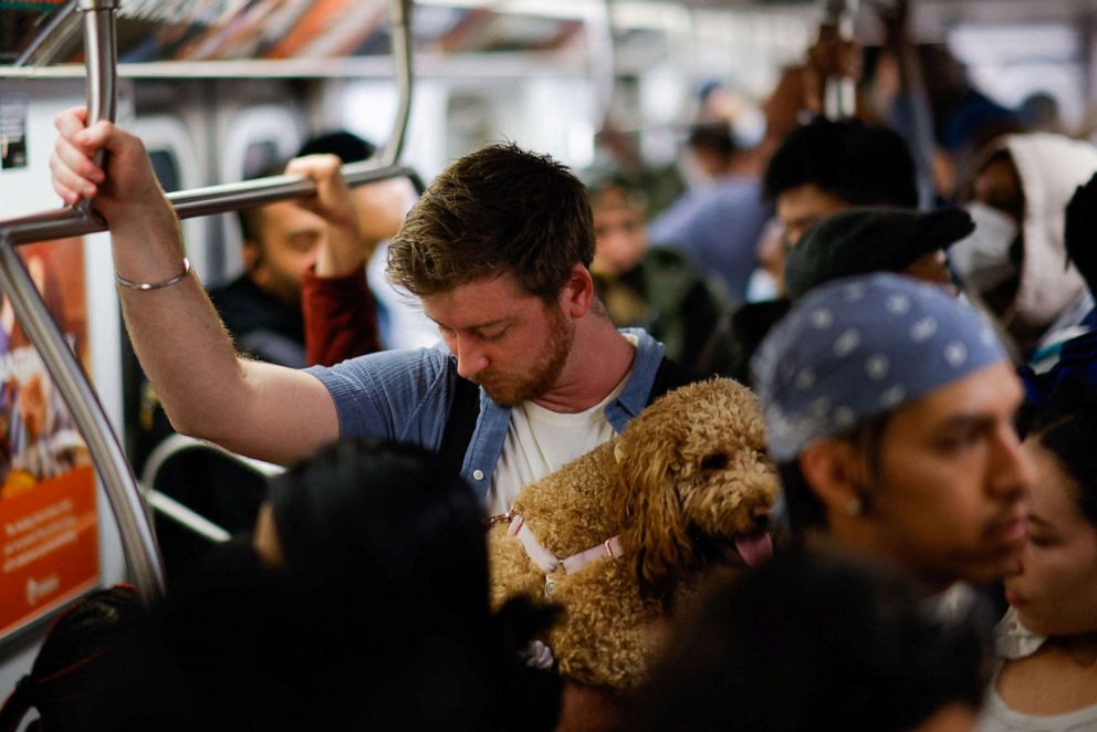 PHOTO: People ride the subway in New York, April 15, 2022.