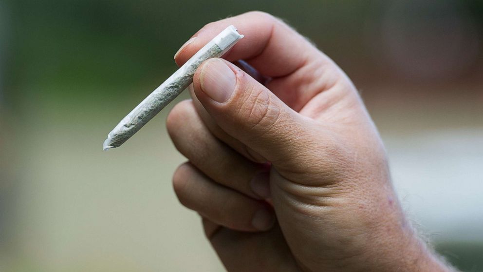 PHOTO: A person holds a marijuana joint in this stock photo.