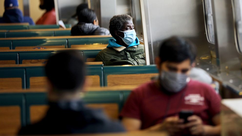 PHOTO: People ride the Staten Island Ferry wearing protective face masks in New York, Nov. 12, 2020.