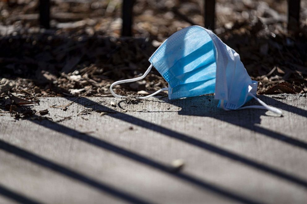 PHOTO: A discarded surgical mask, April 26, 2022, in Chicago.