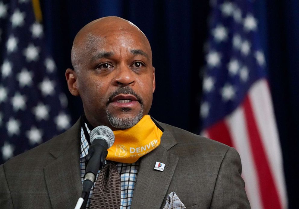 PHOTO: Denver Mayor Michael Hancock makes a point during a news conference about the rapid increase in coronavirus cases in the state, Nov. 17, 2020, in Denver.