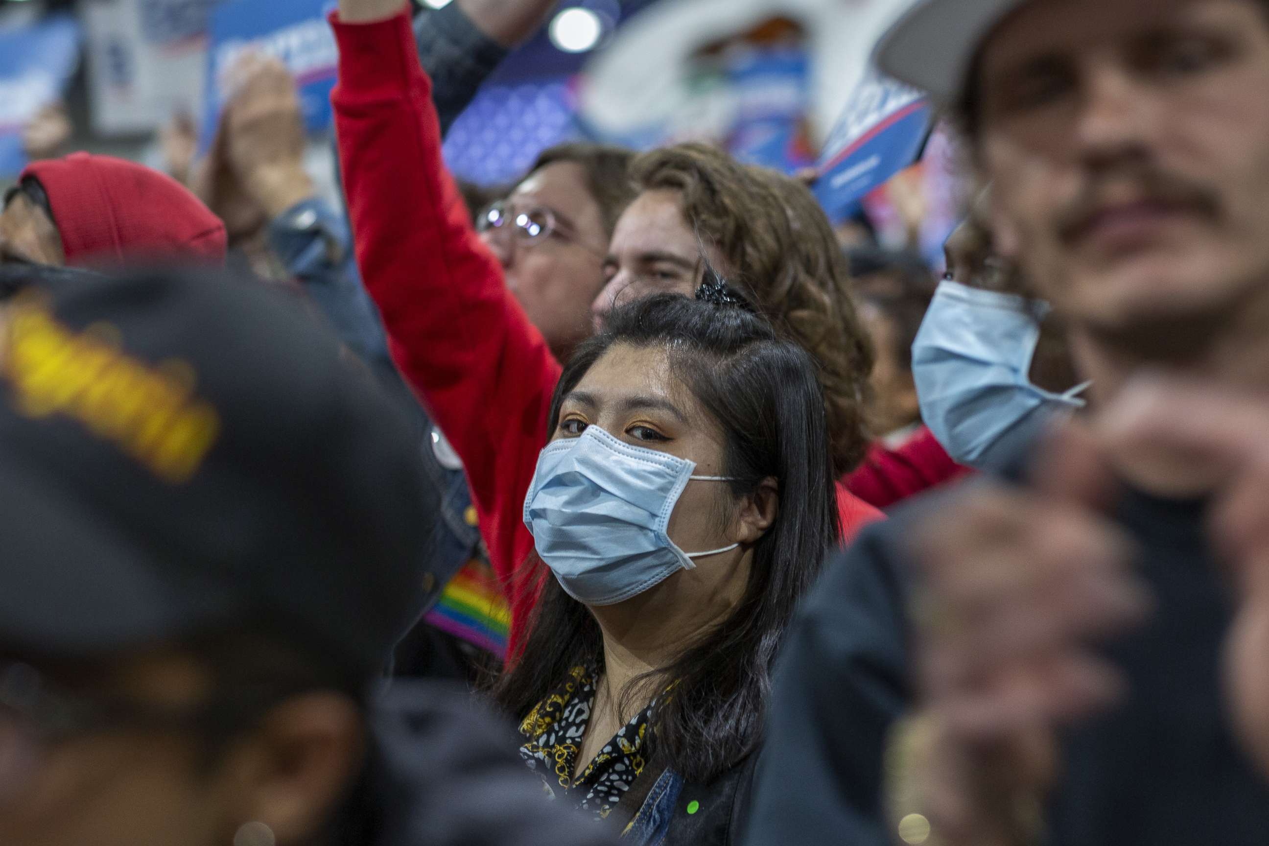 PHOTO: Supporters wear medical masks, as fears of coronavirus increase in California, during a campaign rally for presidential candidate Sen. Bernie Sanders at the Los Angeles Convention Center on March 1, 2020.