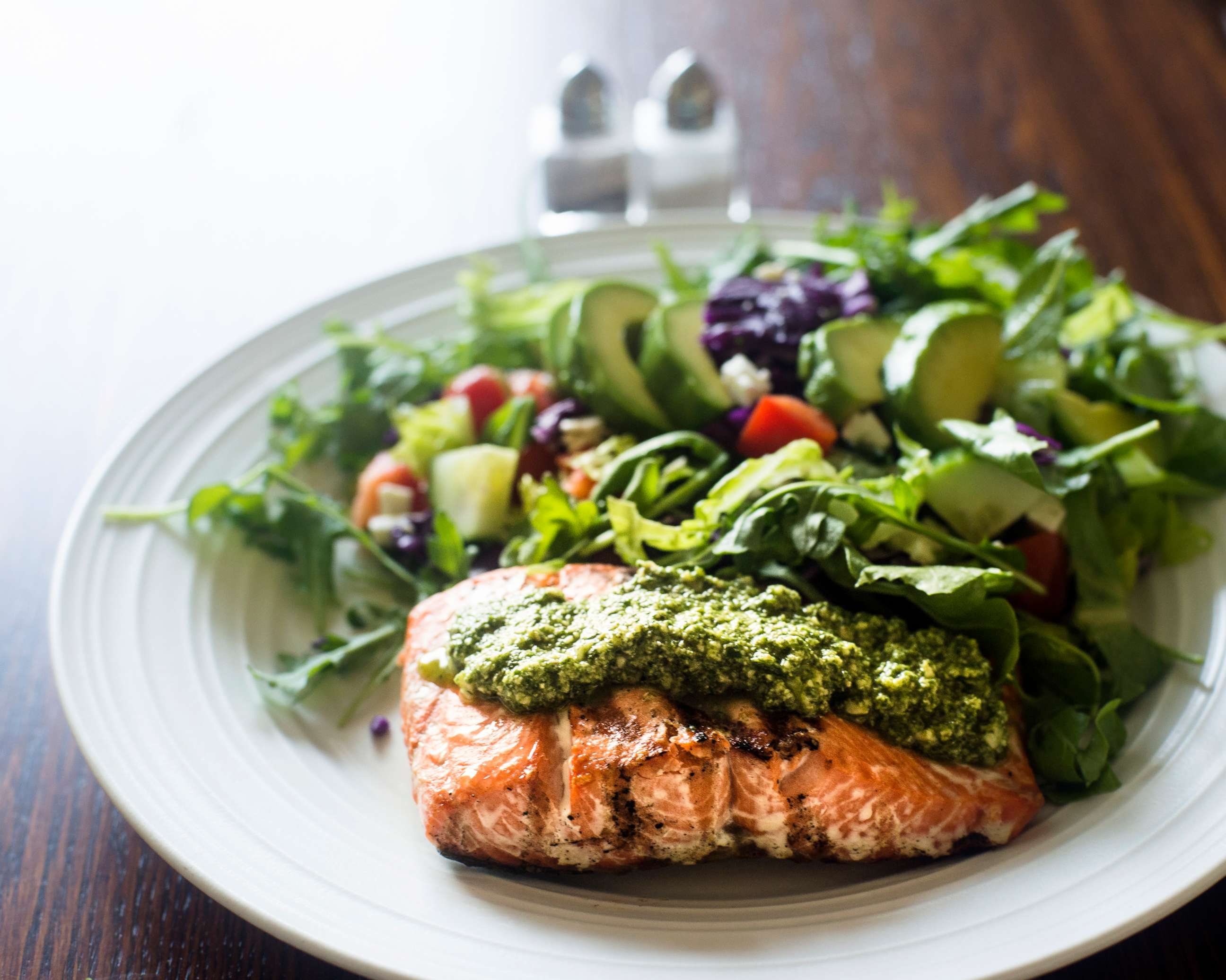 PHOTO: This stock photo depicts a filet of salmon with pesto and a side salad.