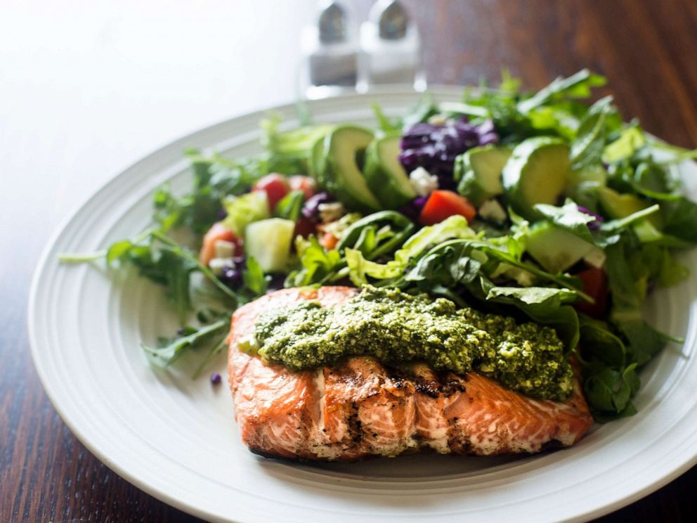 PHOTO: This stock photo depicts a filet of salmon with pesto and a side salad.