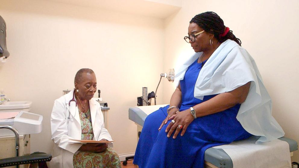 PHOTO: Dr. Melissa Freeman speaks with a patient at her private practice in Harlem, New York.
