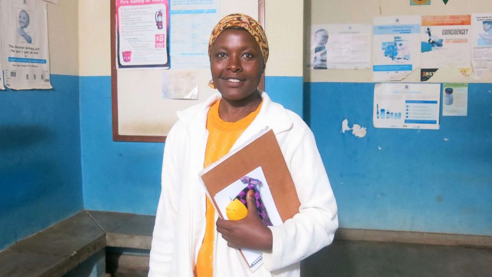 PHOTO: Sister Immaculate Owembabazi, 42, a psychiatric nurse, stands in the waiting room of Kisoro District Hospital.