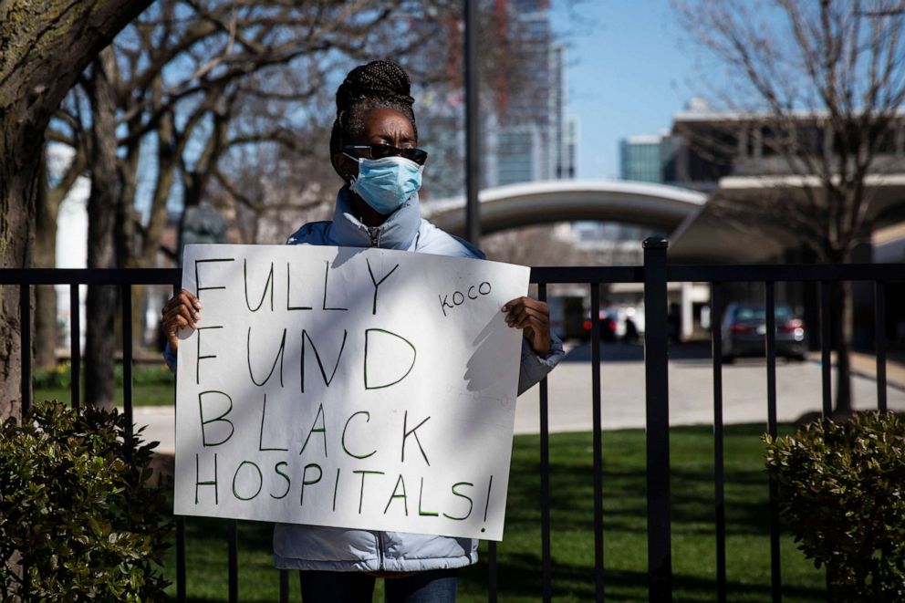 PHOTO: Activists protest outside Mercy Hospital & Medical Center in Chicago about alleged racial disparities in health care during the coronavirus pandemic, April 20, 2020.