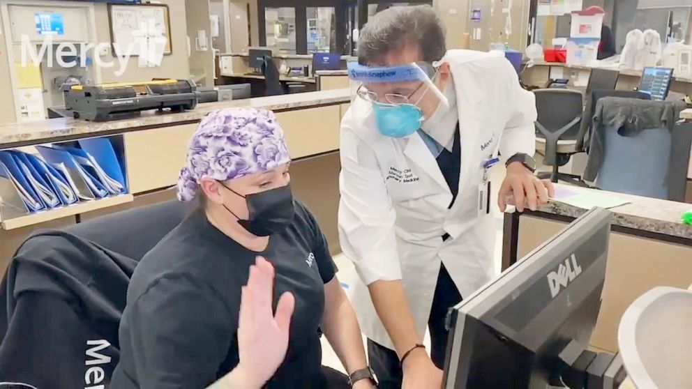 PHOTO: Dr. Maroun Tawk medical staff work wearing COVID-19 PPE in the ICU of Mercy Hospital in Oklahoma City, Nov. 26, 2020.