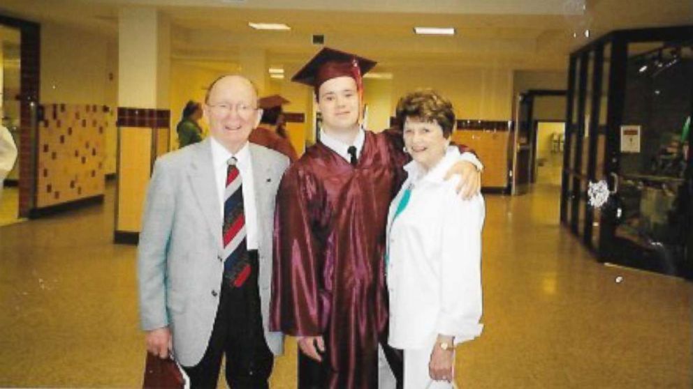PHOTO: Michael Clayburgh, center, poses with his grandfather and a family member at his high school graduation.