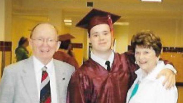 PHOTO: Michael Clayburgh, center, poses with his grandfather and a family member at his high school graduation.