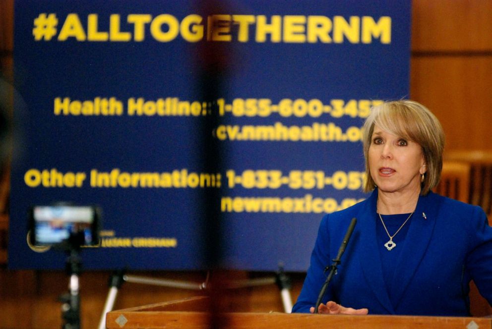 PHOTO: New Mexico Gov. Michelle Lujan Grisham confirmed a new coronavirus infection that has no apparent link to travel, March 18, 2020, during a news conference on the floor of the state House of Representatives in Santa Fe, N.M.