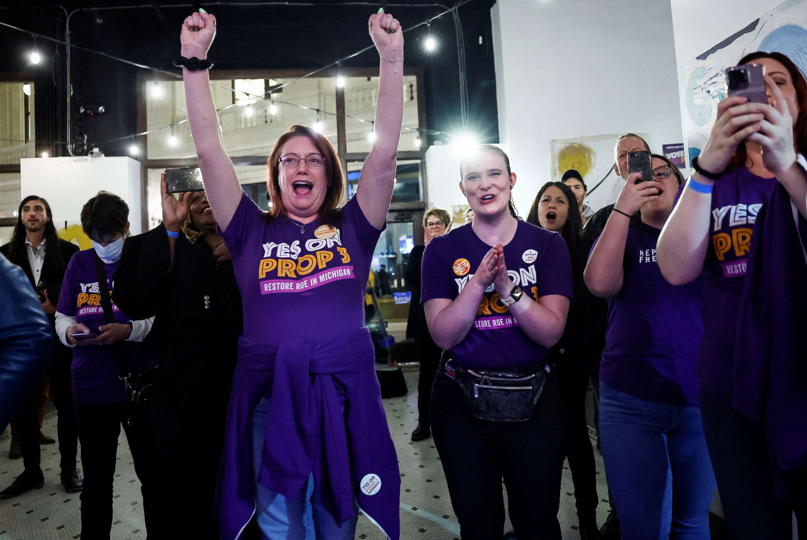 PHOTO: Women cheer as they hear early voting results indicating the passage of Proposition 3, a midterm ballot measure that enshrines abortion rights, during a Reproductive Freedom For All watch party on election night in Detroit, Mich., Nov. 8, 2022.