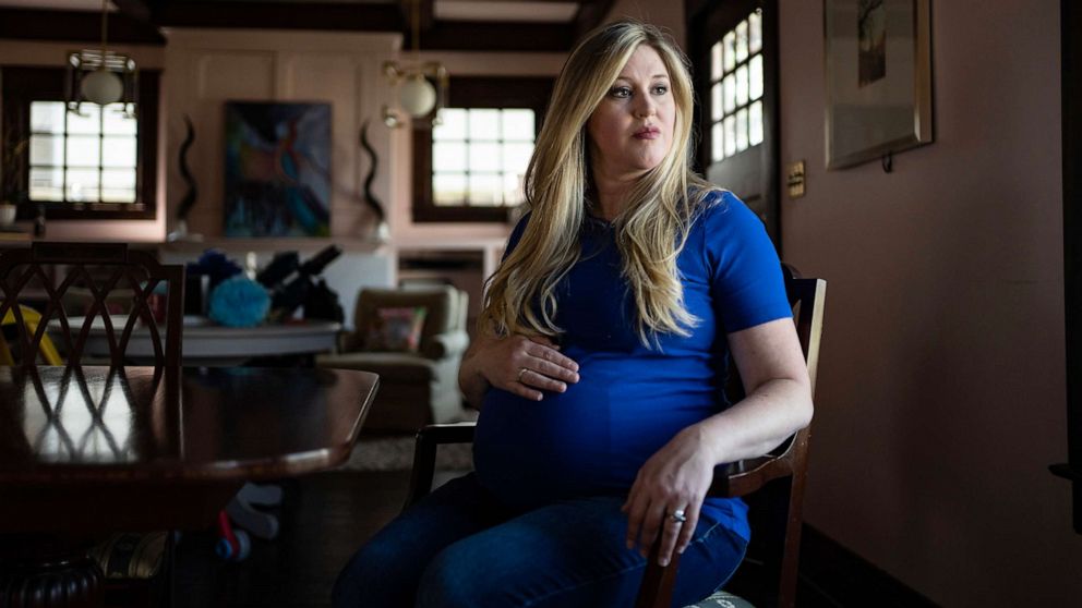 PHOTO: Lauren Miller, who had to travel to Colorado to have an abortion for one of her twins, at home in Dallas, March 5, 2023.