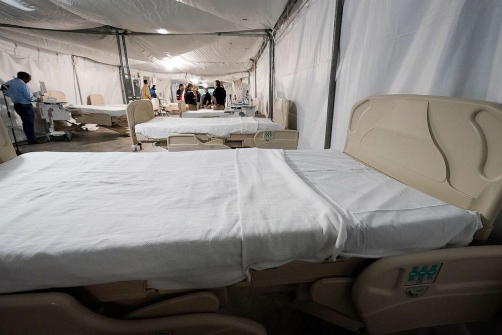 PHOTO: Beds await patients in the completed section of a COVID-19 mobile field hospital erected in a parking garage at the University of Mississippi Medical Center in Jackson, Miss., Thursday, Aug. 12, 2021.