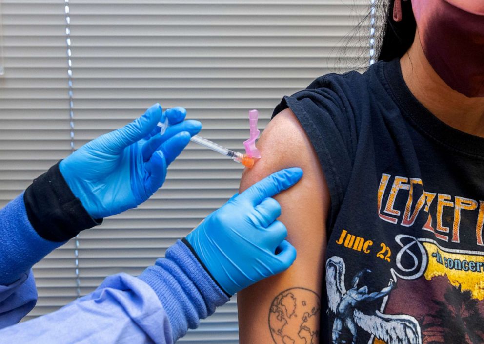 PHOTO: A healthcare worker administers a dose of the Pfizer-BioNTech Covid-19 vaccine to a resident at the Jordan Valley Community Health Center in Springfield, Missouri, June 29, 2021.