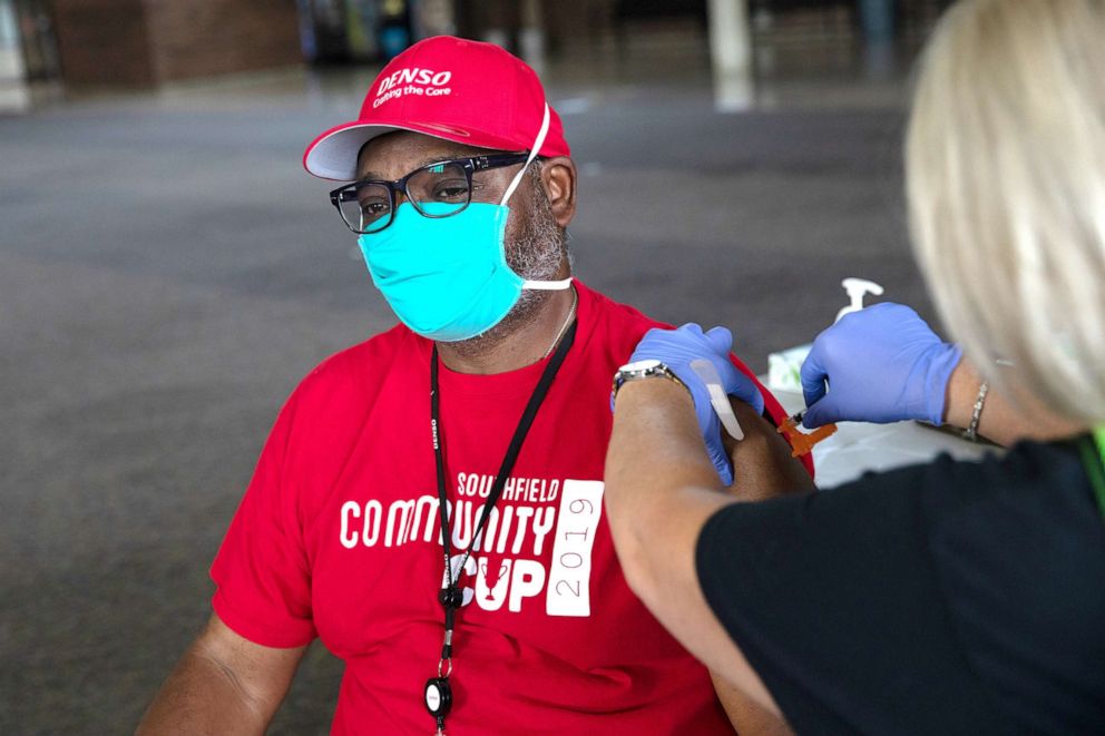 PHOTO: A person receives a booster dose of the Moderna coronavirus vaccine during an Oakland County Health Department vaccination clinic in Southfield, Mich., Aug. 24, 2021.