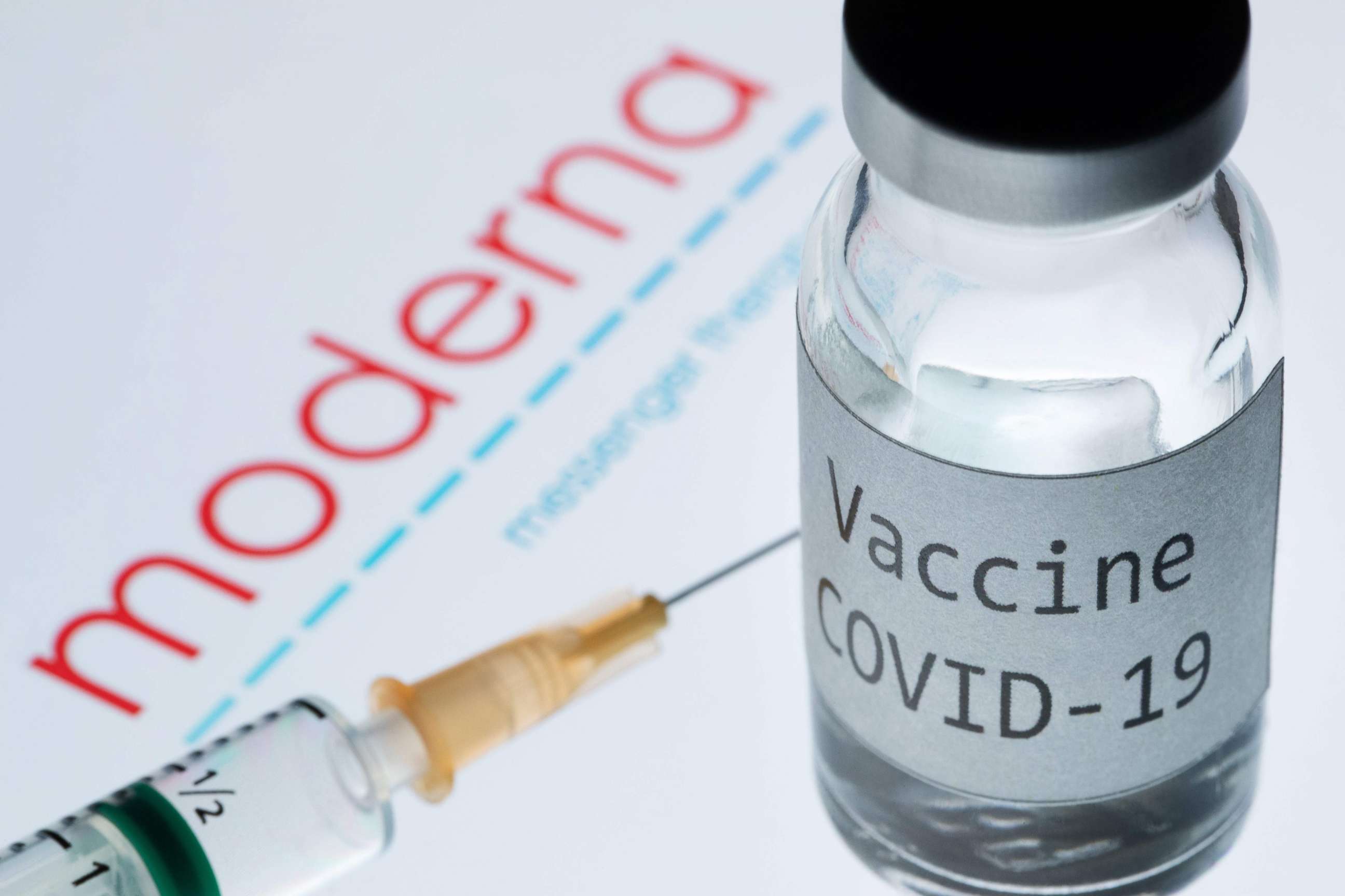 PHOTO: Syringe and bottle reading "Vaccine COVID-19" next to the Moderna biotech company logo, Nov. 18, 2020.