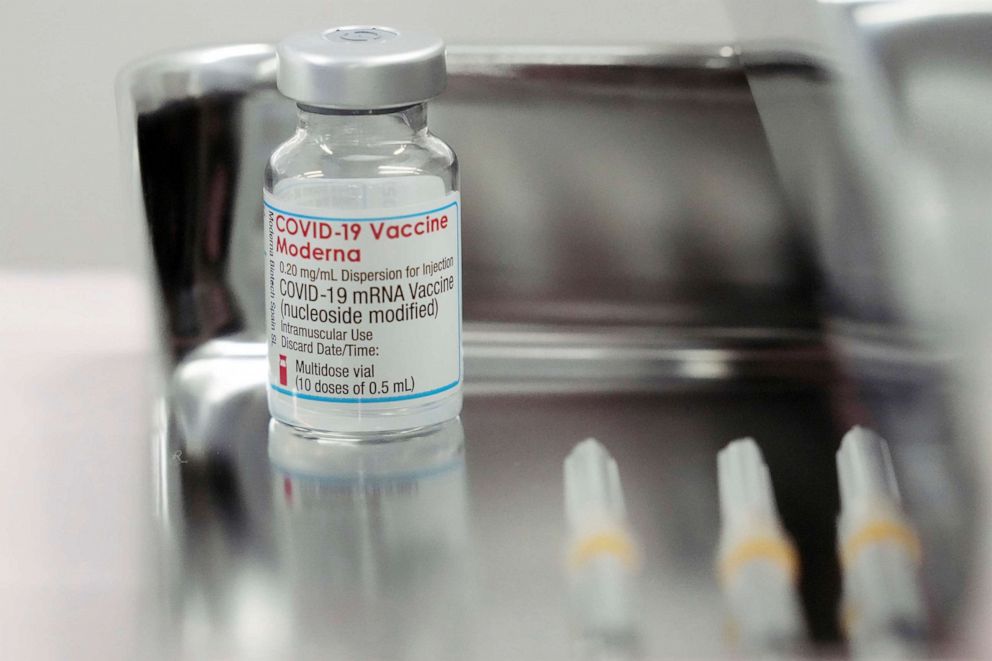 PHOTO: This file photo taken on June 14, 2021, shows a vial of the Moderna COVID-19 vaccine that is being administered for flight attendants of Japan Airlines at Haneda Airport in Tokyo as the airline began its workplace vaccination.