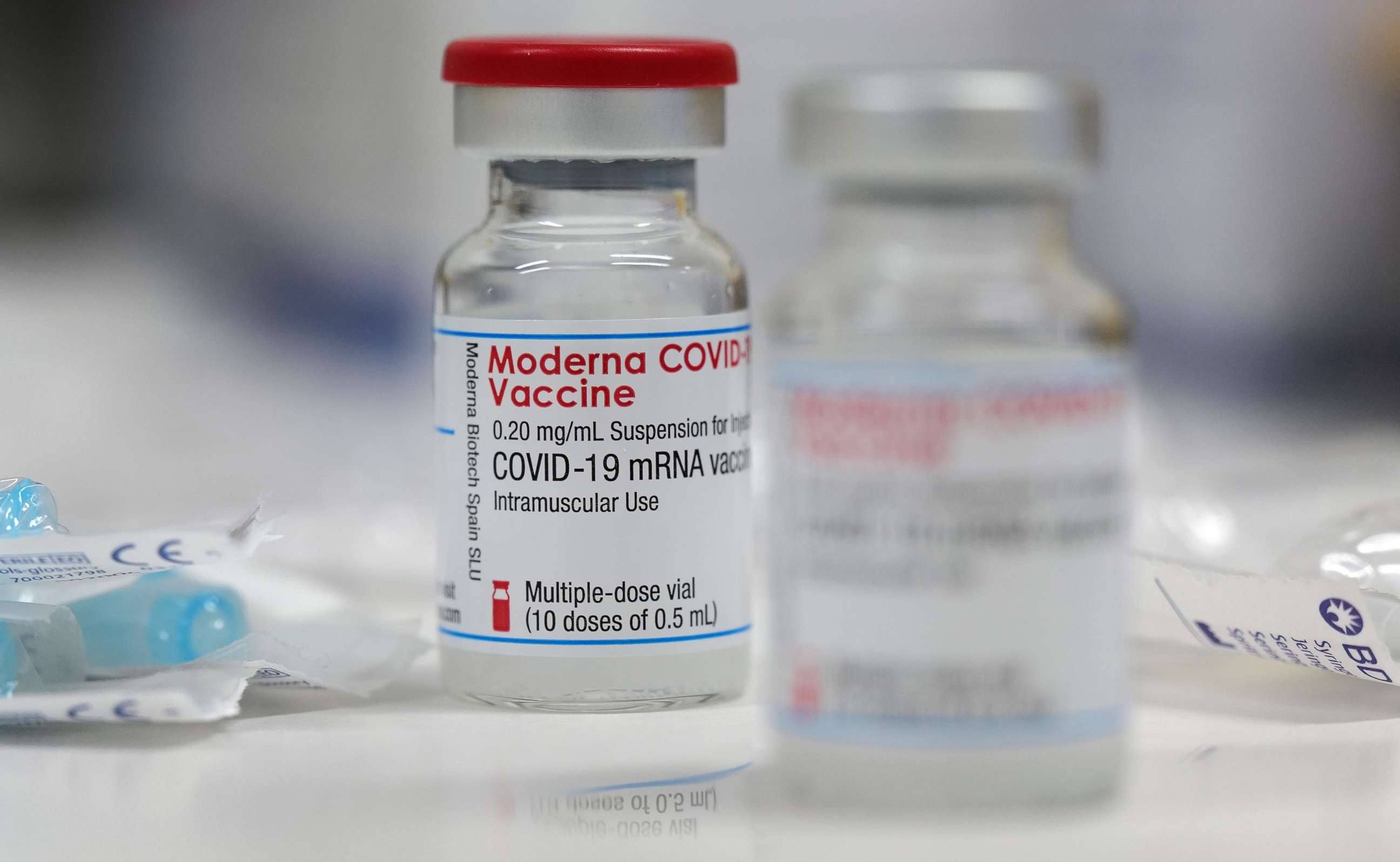 FILE PHOTO: A vial of the Moderna COVID-19 vaccine is seen at a local clinic as the spread of the coronavirus disease continues in Aschaffenburg, Germany, Jan. 15, 2021.