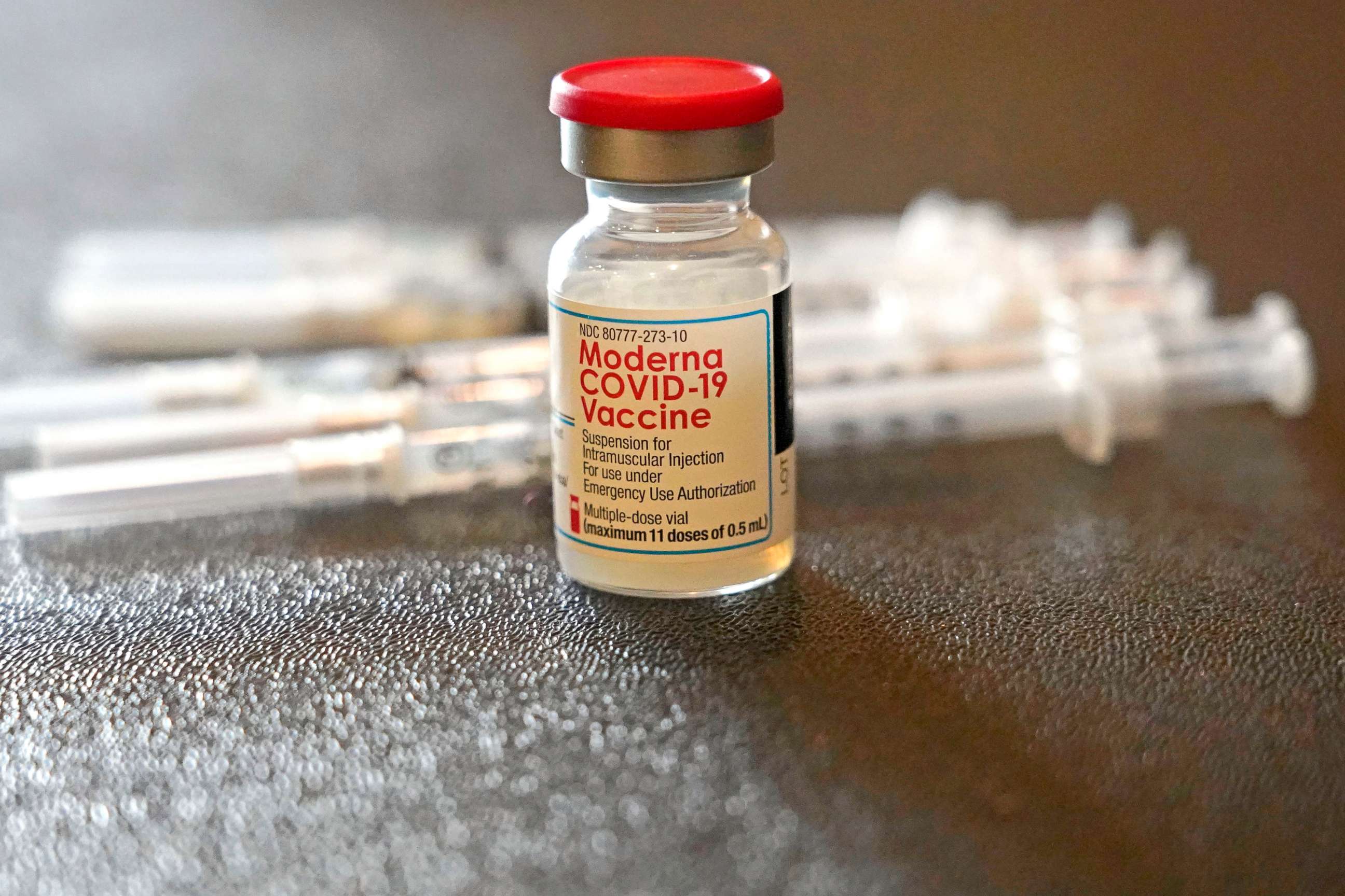 PHOTO: A vial filled with the Moderna COVID-19 vaccine rests by syringes waiting to be loaded by nurses from the Jackson-Hinds Comprehensive Health Center, at a vaccination station next to Jackson State University in Jackson, Miss., Dec. 7, 2021.