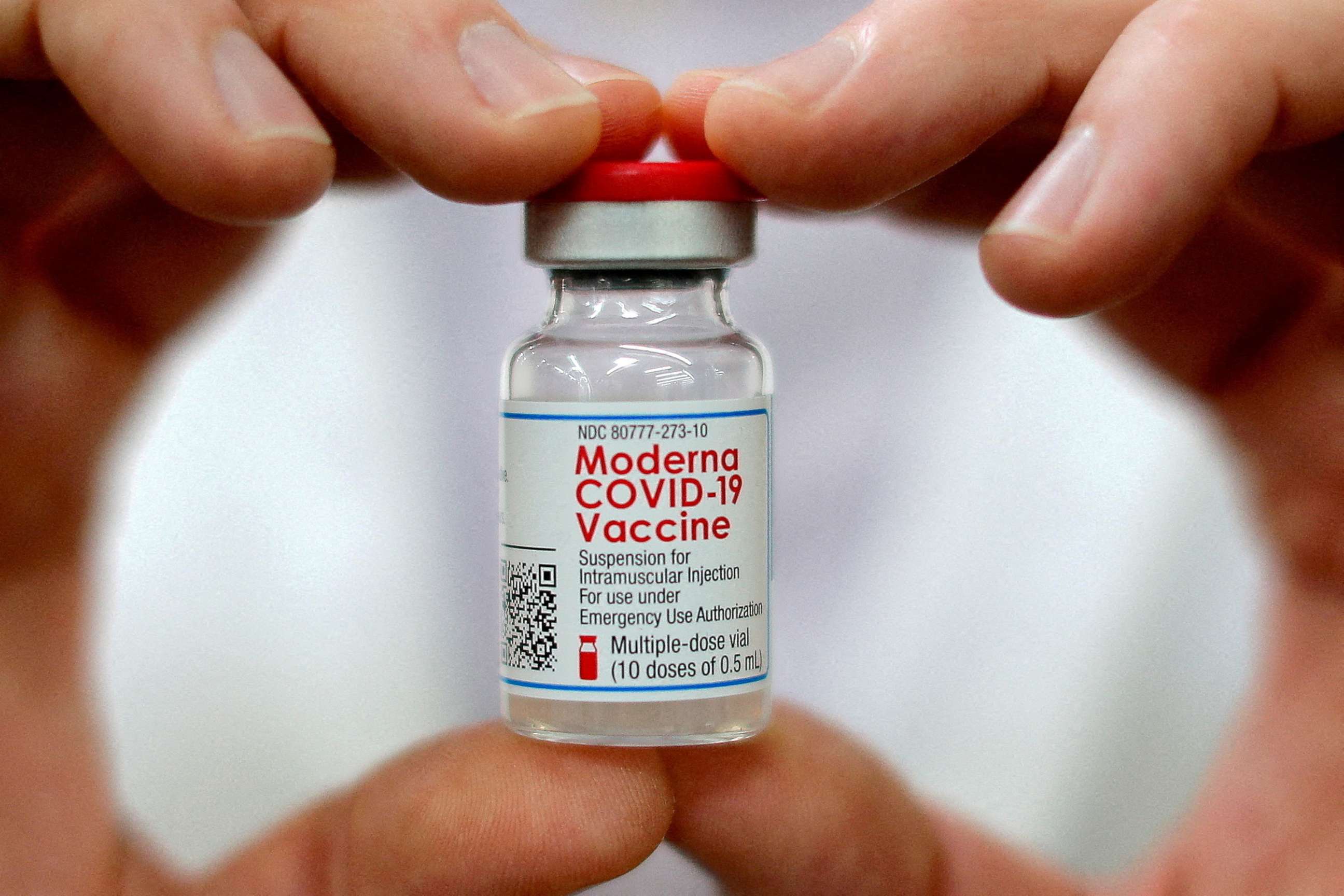 PHOTO: A pharmacist holds a vial of the Moderna COVID-19 vaccine in West Haven, Conn., Feb. 17, 2021.
